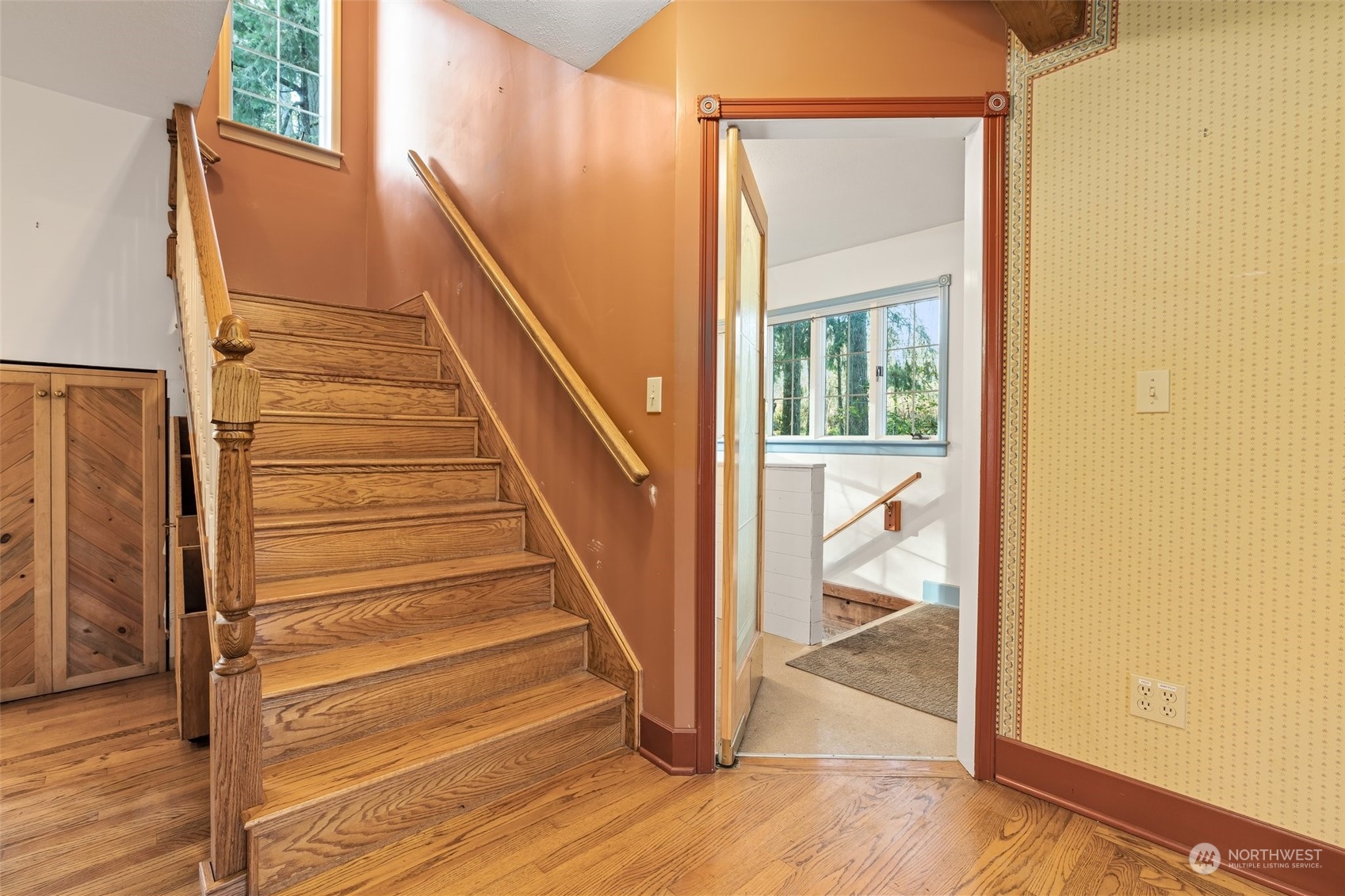8120 Libby Road Northeast Olympia, WA 98506 - Photo 13 of 36 a view of entryway and hall with wooden floor