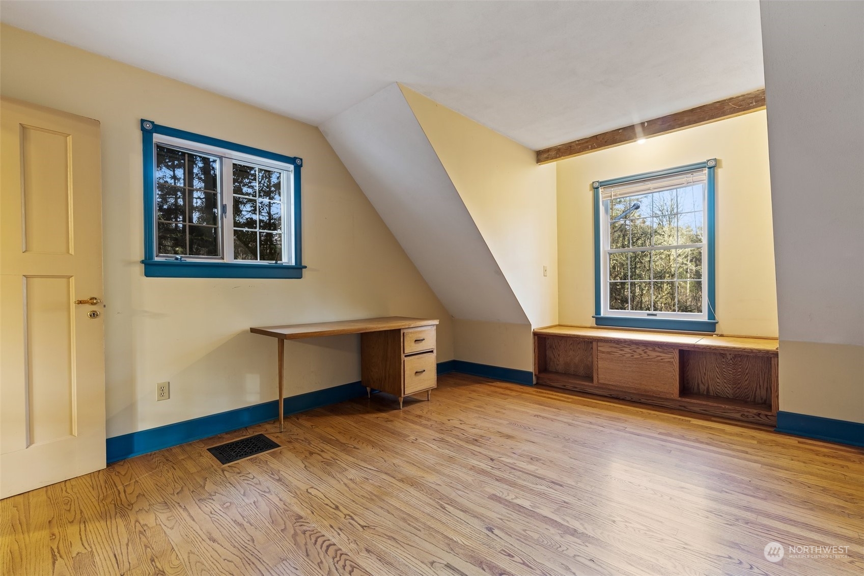 8120 Libby Road Northeast Olympia, WA 98506 - Photo 16 of 36 a view of an empty room with a window and wooden floor