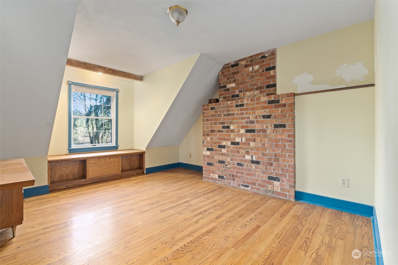 8120 Libby Road Northeast Olympia, WA 98506 - Photo 17 of 36 wooden floor in an empty room with a window