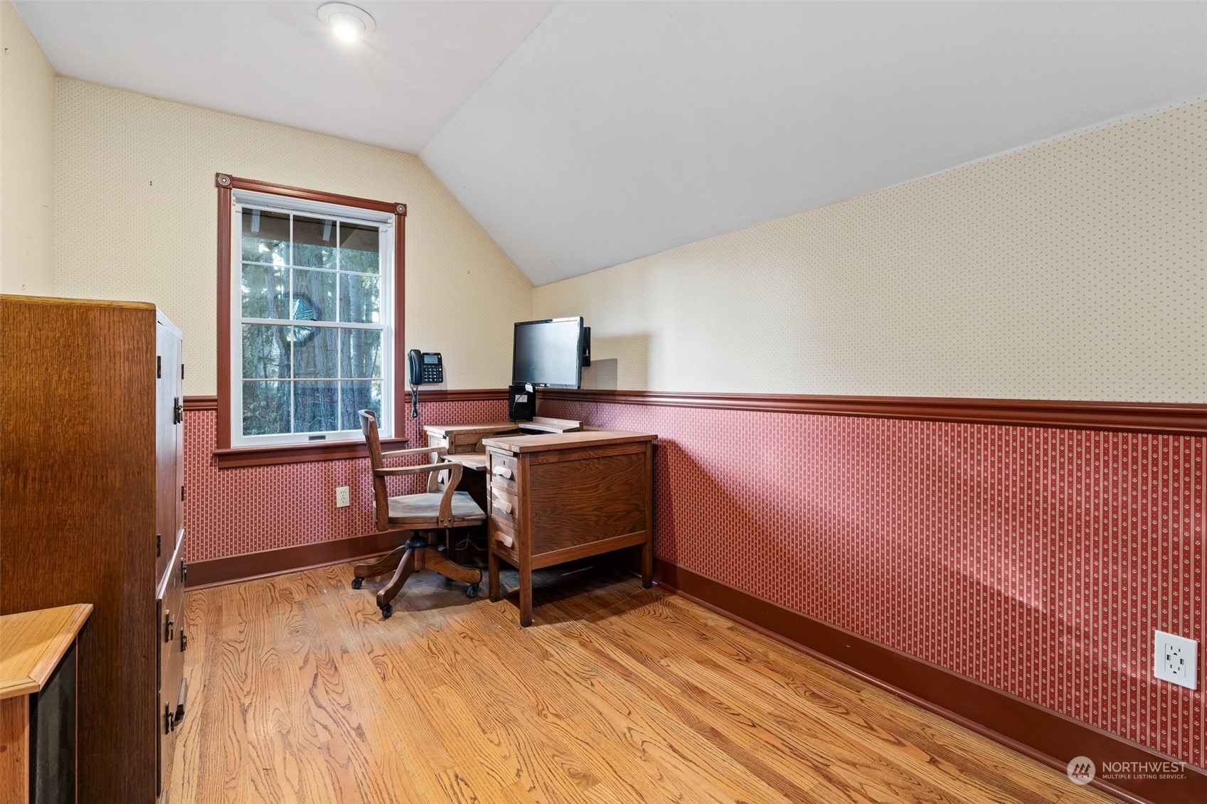 8120 Libby Road Northeast Olympia, WA 98506 - Photo 19 of 36 a view of a workspace with furniture and a window
