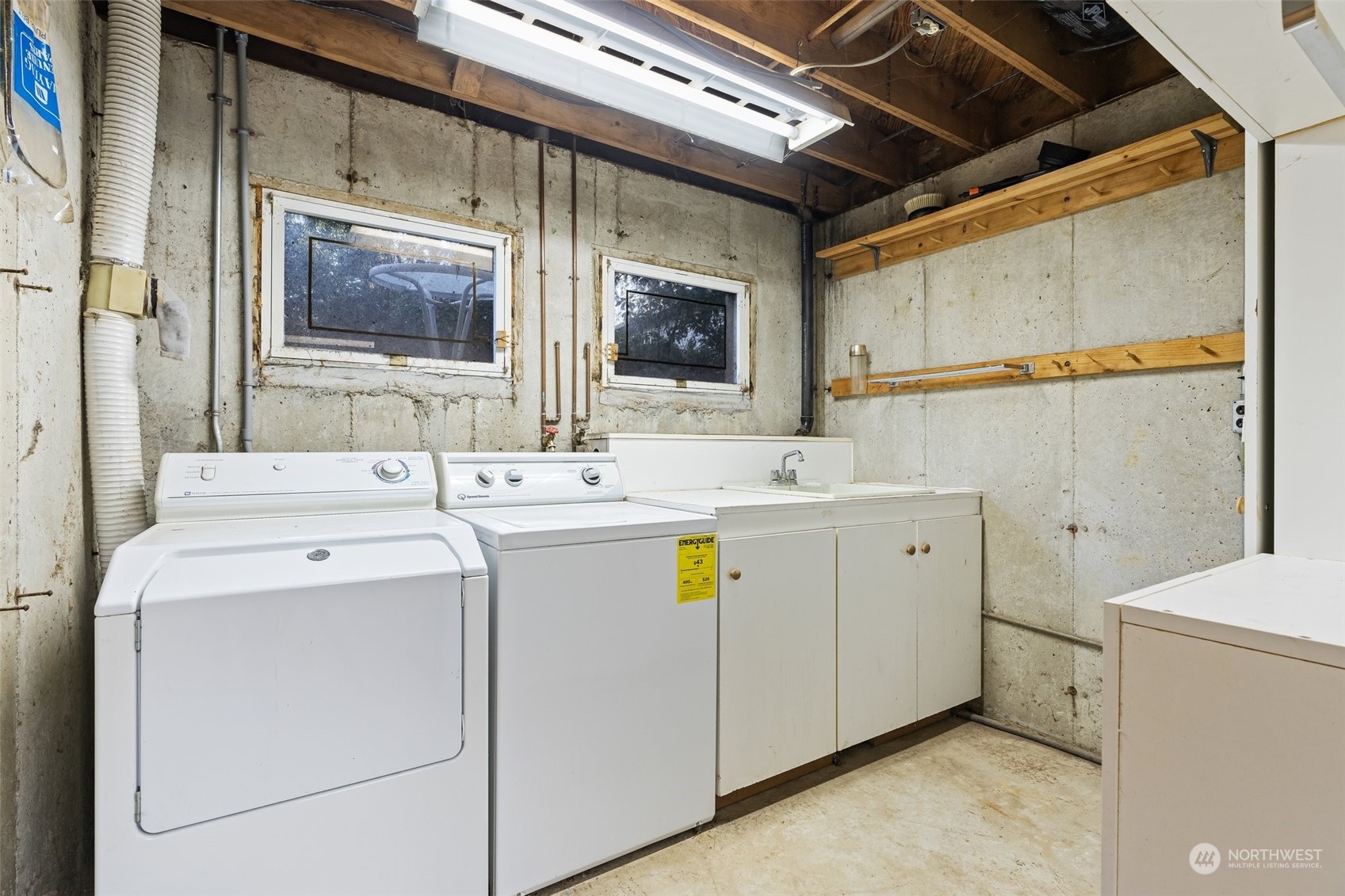 8120 Libby Road Northeast Olympia, WA 98506 - Photo 23 of 36 a utility room with dryer and washer
