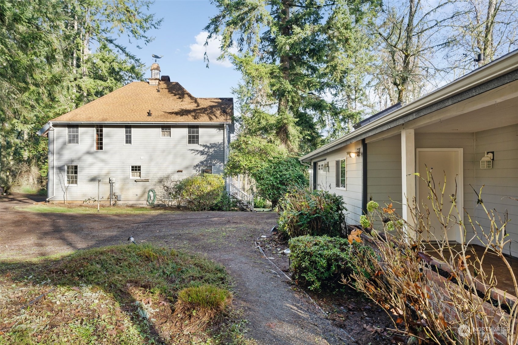 8120 Libby Road Northeast Olympia, WA 98506 - Photo 6 of 36 a front view of a house with garden