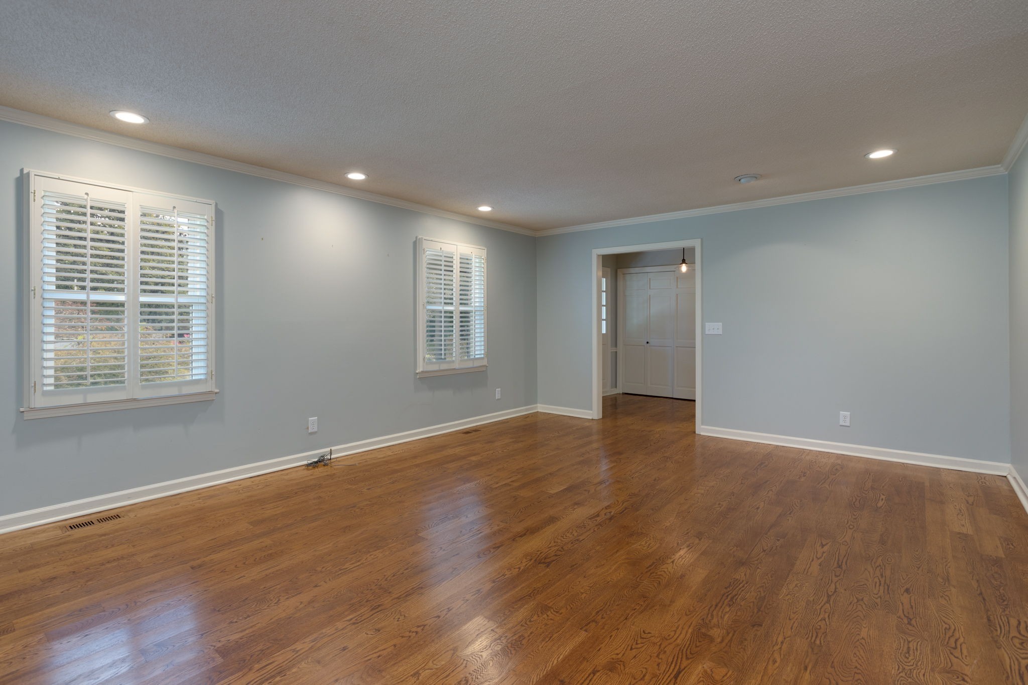 3557 Forest Park Road Springfield, TN 37172 - Photo 16 of 47 a view of an empty room with wooden floor and a window