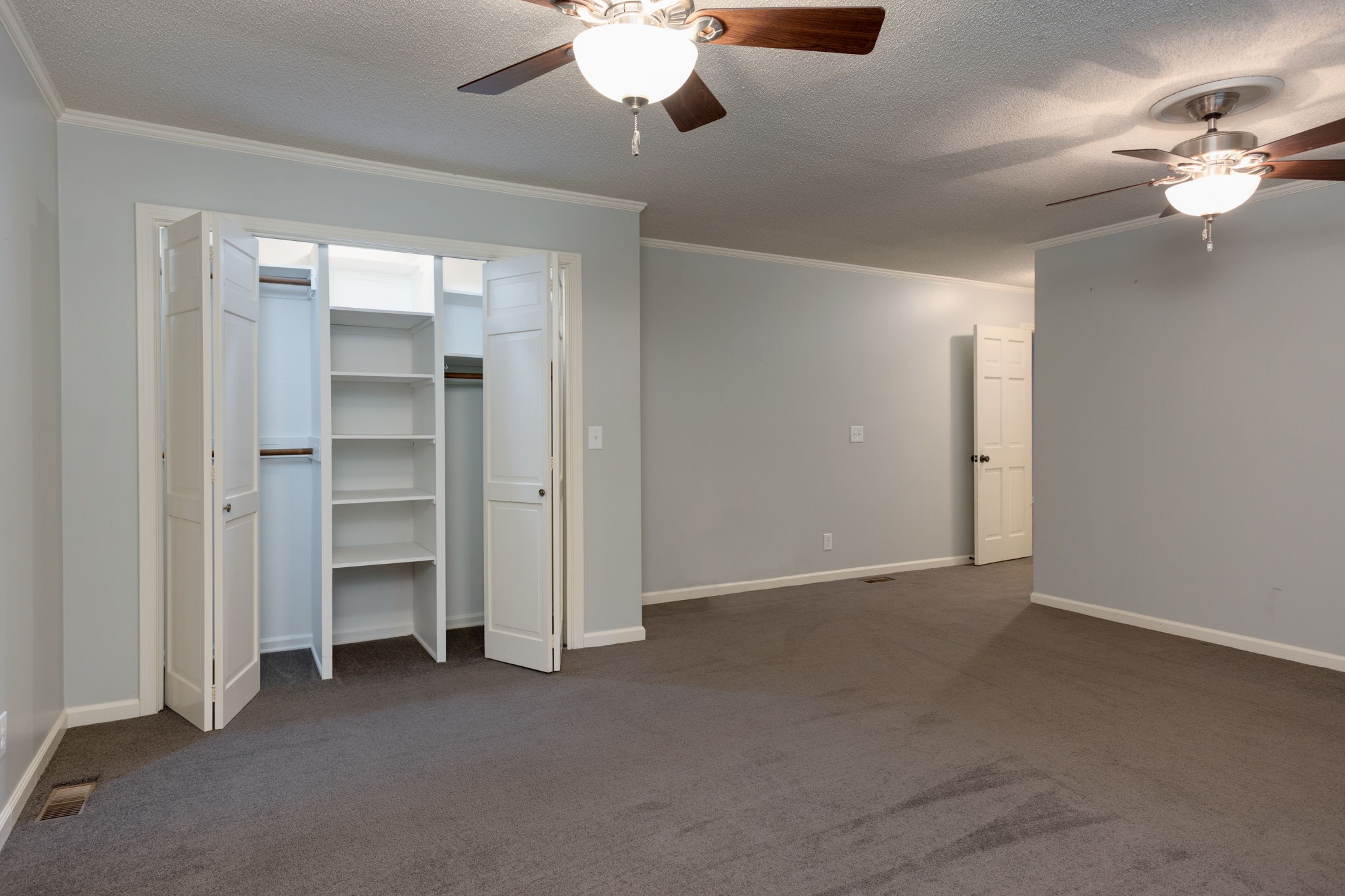 3557 Forest Park Road Springfield, TN 37172 - Photo 18 of 47 a view of an empty room with a ceiling fan