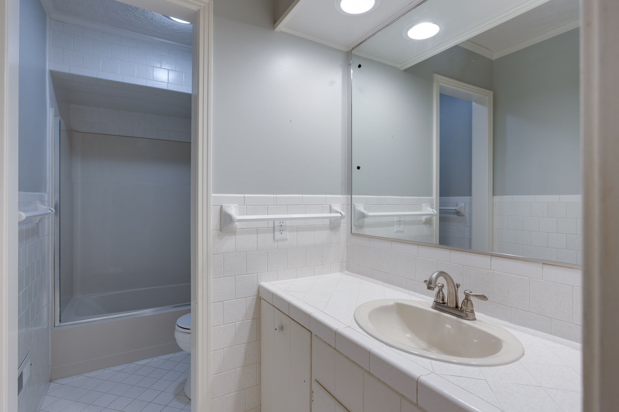 3557 Forest Park Road Springfield, TN 37172 - Photo 23 of 47 a bathroom with a sink and a mirror