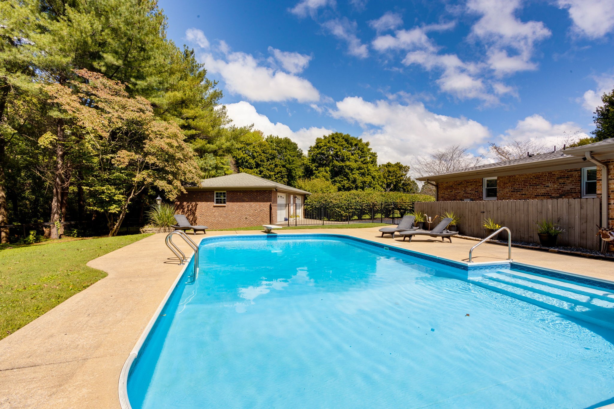 3557 Forest Park Road Springfield, TN 37172 - Photo 40 of 47 a swimming pool with wooden fence