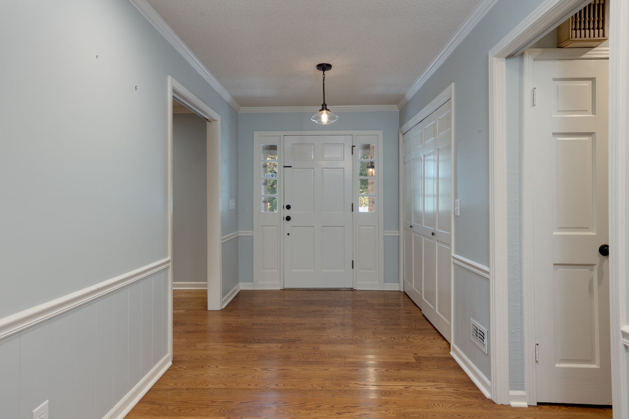 3557 Forest Park Road Springfield, TN 37172 - Photo 6 of 47 a view of a hallway with wooden floor and staircase