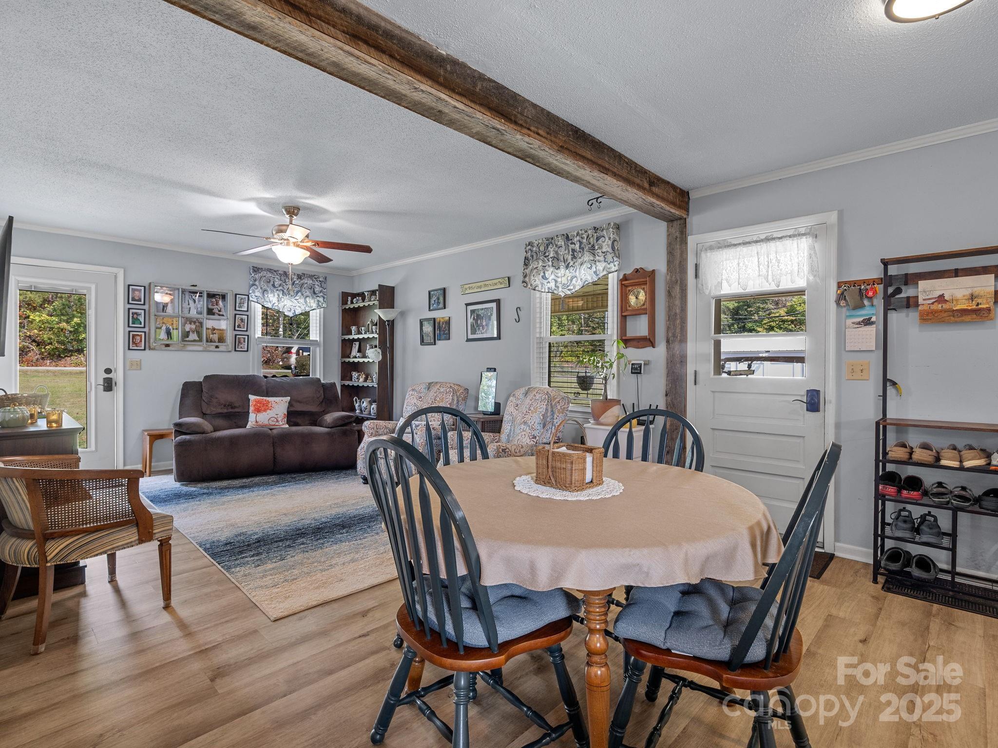 12 Lister Road Taylors, SC 29687 - Photo 15 of 37 a view of a dining room with furniture and wooden floor