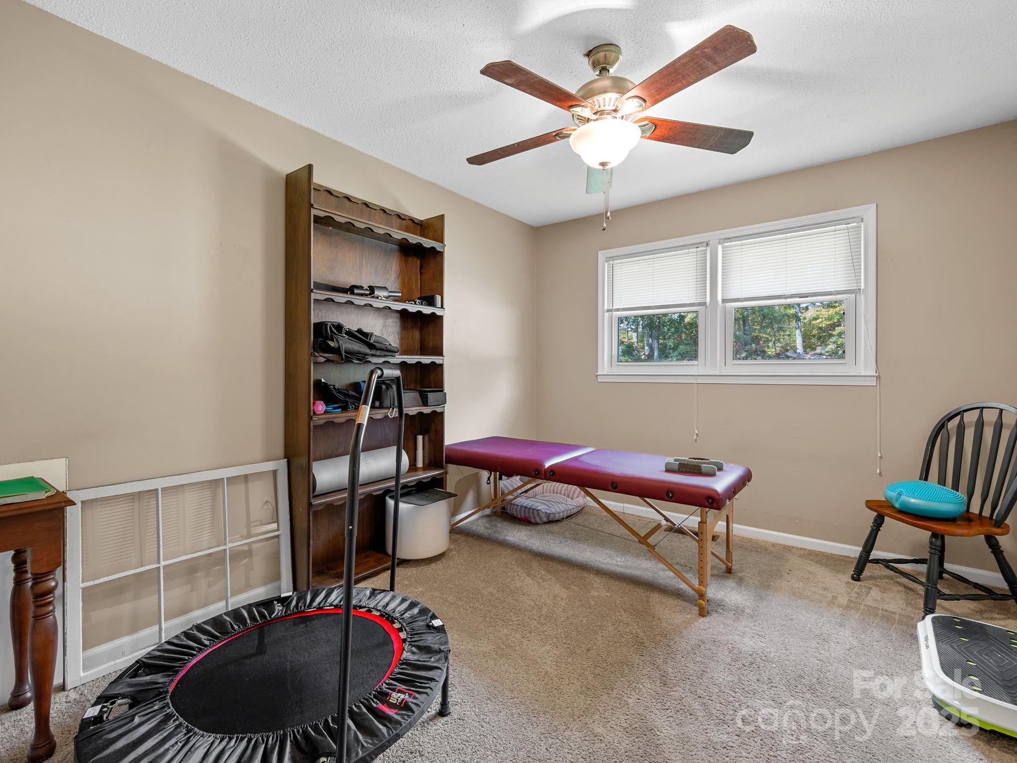12 Lister Road Taylors, SC 29687 - Photo 24 of 37 a living room with furniture and a chair