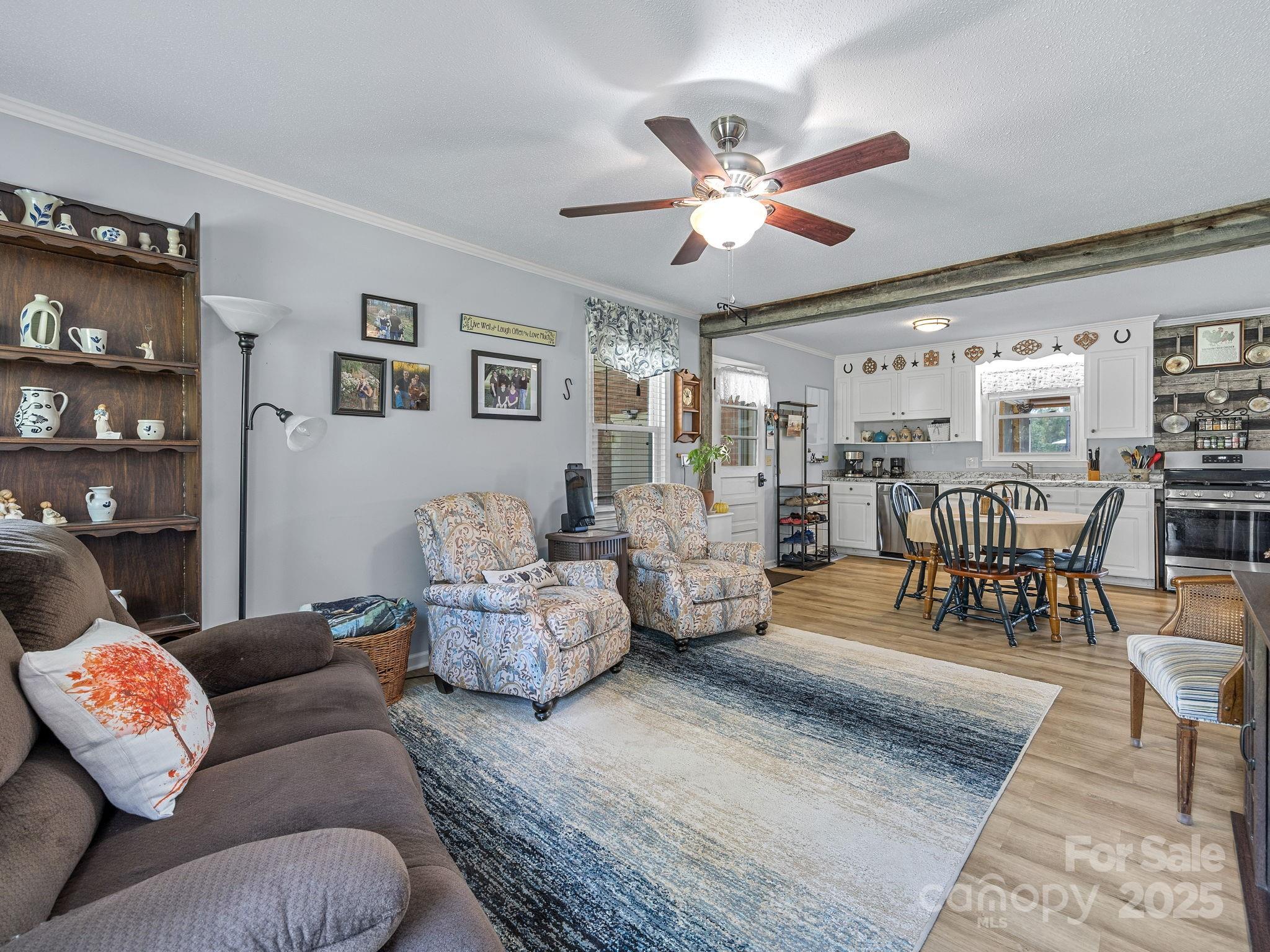 12 Lister Road Taylors, SC 29687 - Photo 9 of 37 a living room with furniture and wooden floor