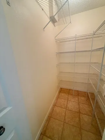 a bathroom with a white tiles