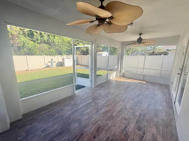 a view of an empty room and window