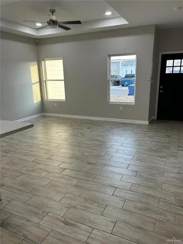 a view of an empty room and window