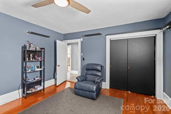 a bathroom with a sink mirror toilet and shower