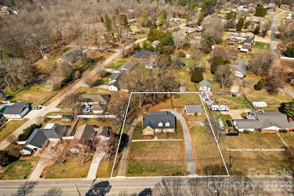 an aerial view of a yard with lots of residential buildings