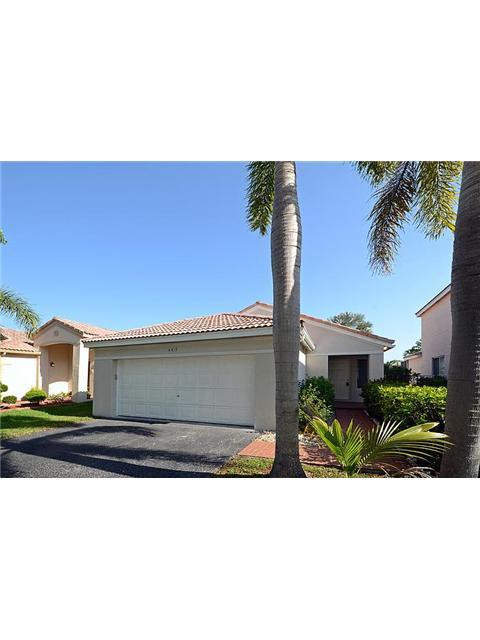 4417 Magnolia Ridge Drive Weston, FL 33331 - Photo 12 of 24 a picture of a bench in front of a building