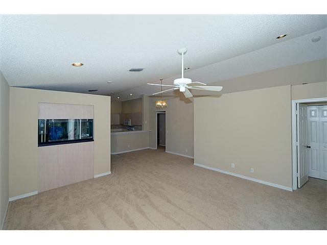 4417 Magnolia Ridge Drive Weston, FL 33331 - Photo 17 of 24 a view of a livingroom with furniture and chandelier