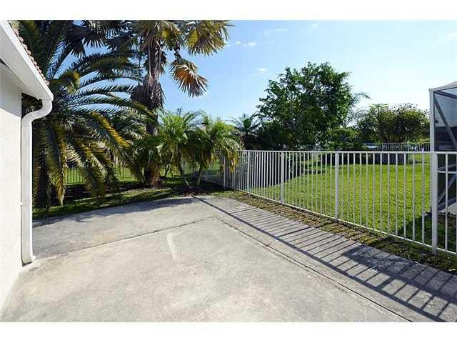 4417 Magnolia Ridge Drive Weston, FL 33331 - Photo 24 of 24 a view of a backyard with a park