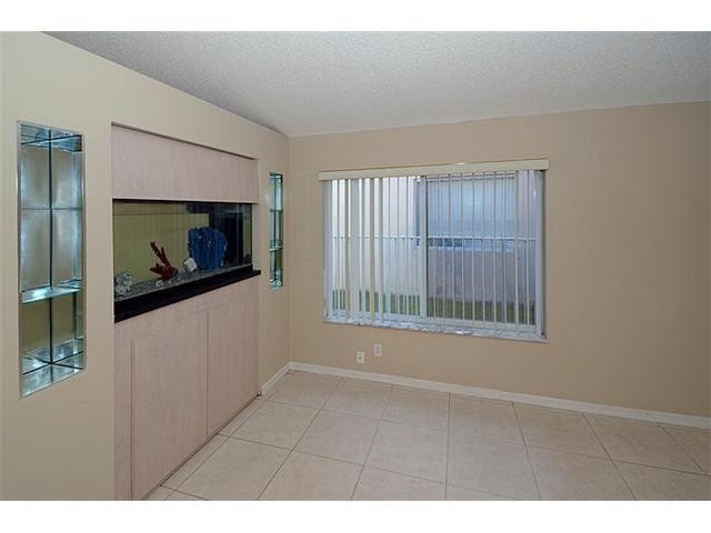 4417 Magnolia Ridge Drive Weston, FL 33331 - Photo 6 of 24 a view of hallway with window
