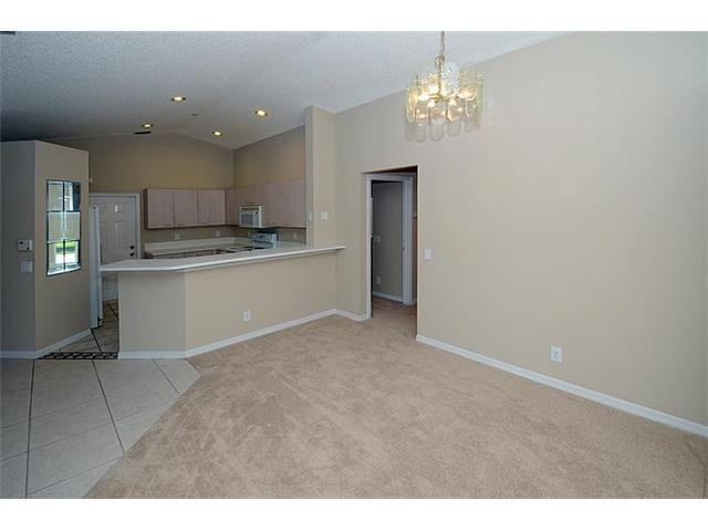 4417 Magnolia Ridge Drive Weston, FL 33331 - Photo 8 of 24 a view of a kitchen with a sink and a refrigerator