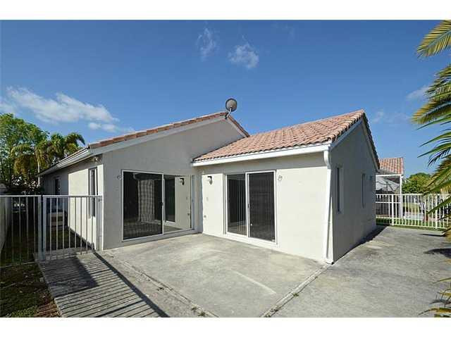 4417 Magnolia Ridge Drive Weston, FL 33331 - Photo 10 of 24 a view of a house with backyard