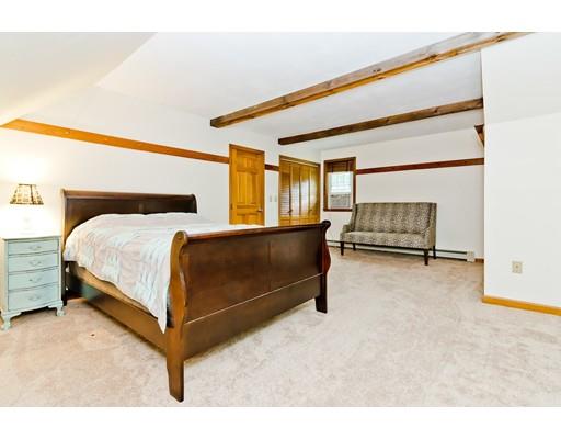225 Locke Road Ashby, MA 01431 - Photo 15 of 27 a bedroom with a bed and a cabinets