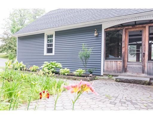 225 Locke Road Ashby, MA 01431 - Photo 24 of 27 a view of a house with potted plants