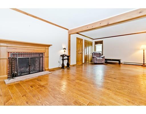 225 Locke Road Ashby, MA 01431 - Photo 10 of 27 a view of empty room with floor to ceiling window and kitchen view
