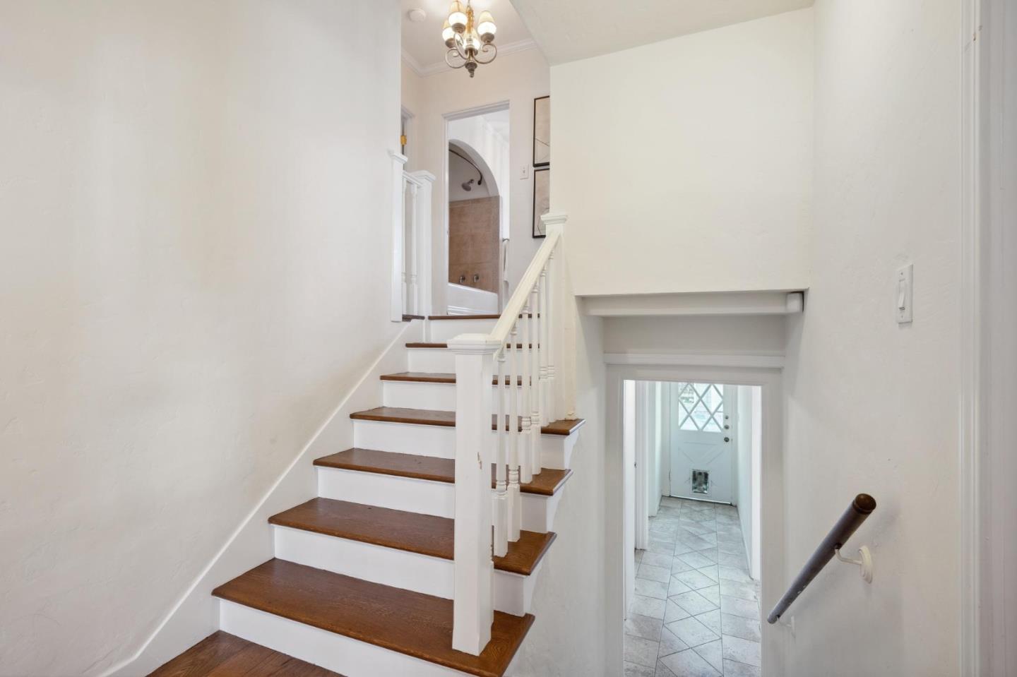 1204 Edgehill Drive Burlingame, CA 94010 - Photo 16 of 38 a view of staircase with white walls and windows