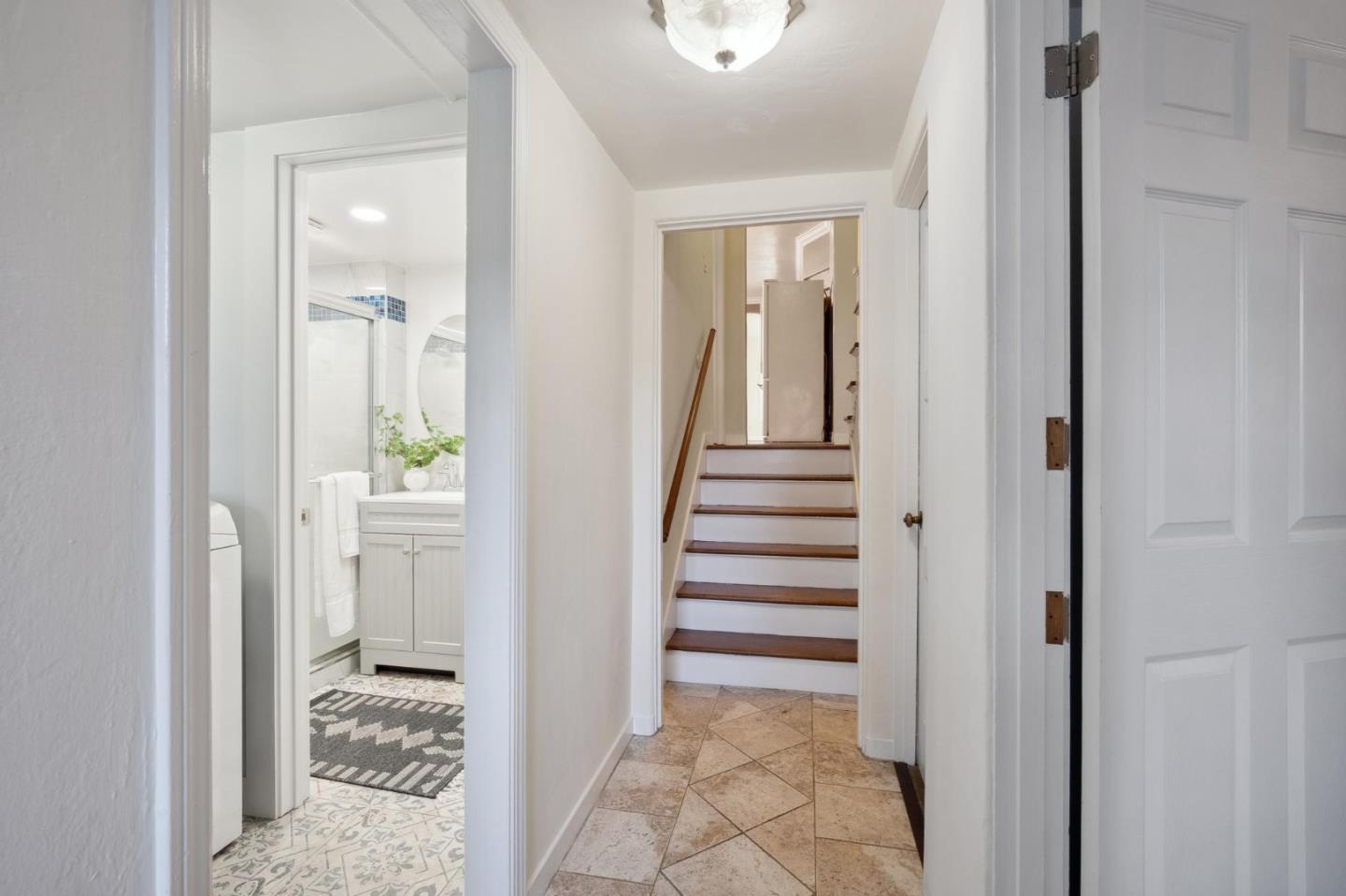 1204 Edgehill Drive Burlingame, CA 94010 - Photo 21 of 38 a view of a bedroom with hallway and closet