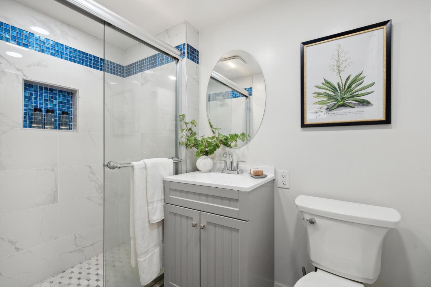 1204 Edgehill Drive Burlingame, CA 94010 - Photo 23 of 38 a bathroom with a sink a toilet and a mirror