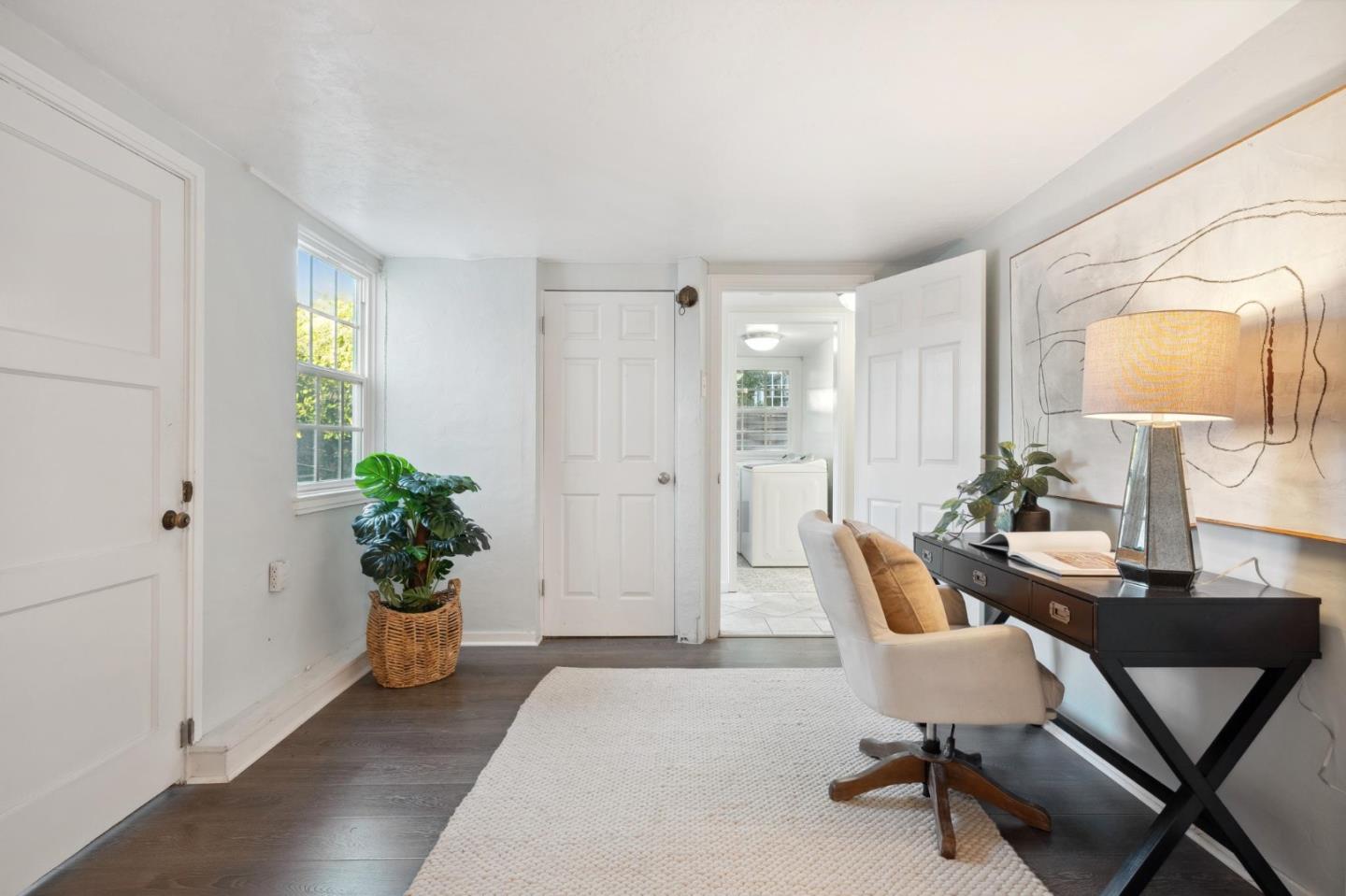 1204 Edgehill Drive Burlingame, CA 94010 - Photo 24 of 38 a view of a livingroom with furniture and a potted plant