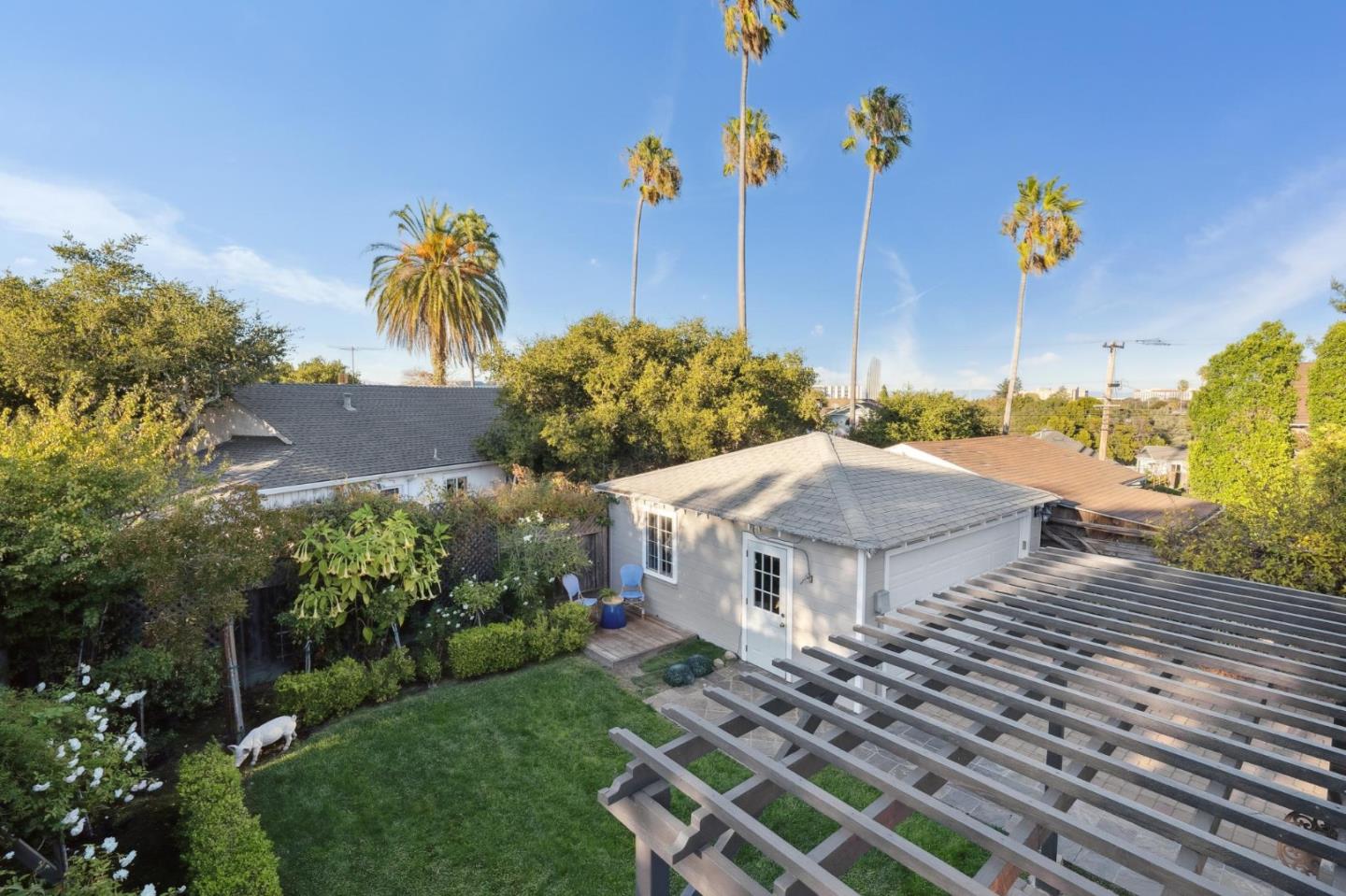 1204 Edgehill Drive Burlingame, CA 94010 - Photo 29 of 38 a view of a house with a garden and a yard