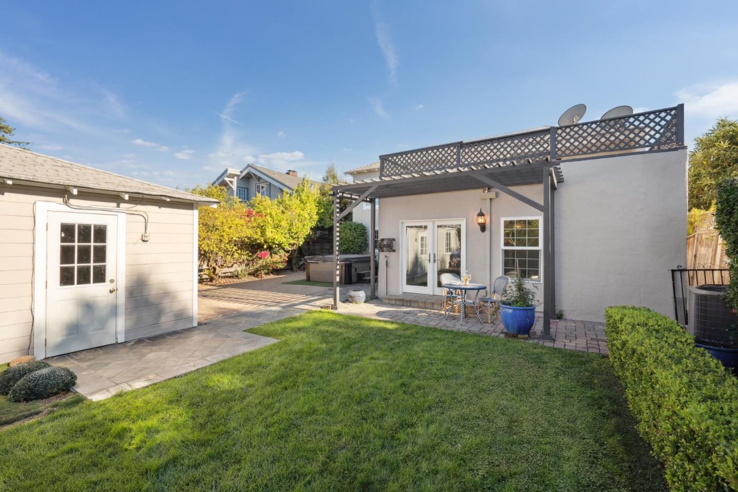 1204 Edgehill Drive Burlingame, CA 94010 - Photo 32 of 38 a view of a house with backyard and porch