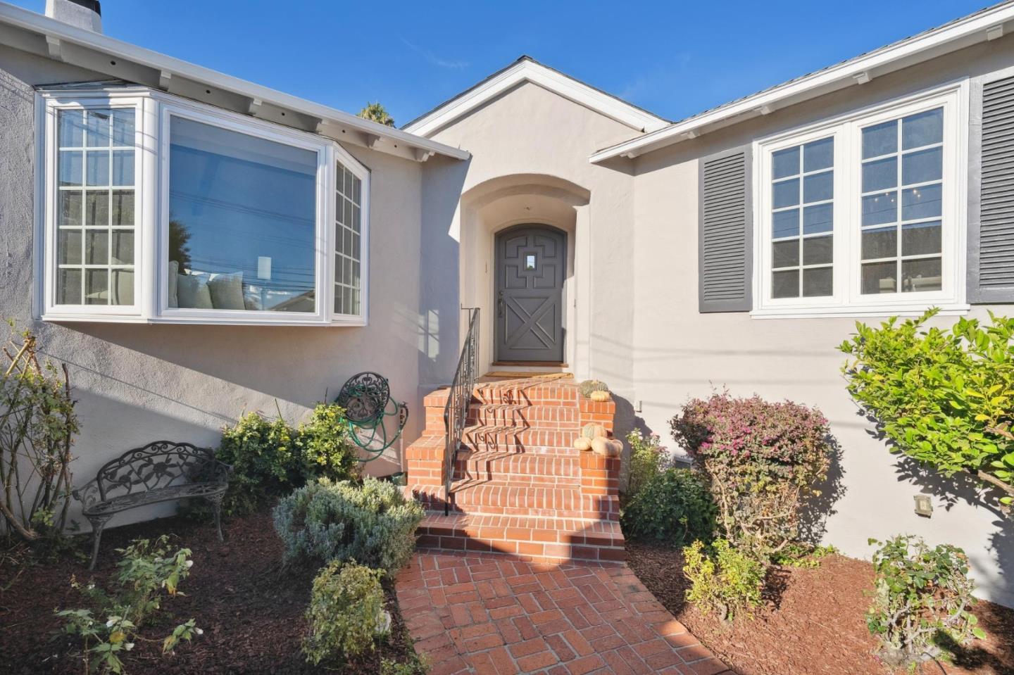 1204 Edgehill Drive Burlingame, CA 94010 - Photo 4 of 38 a front view of a house
