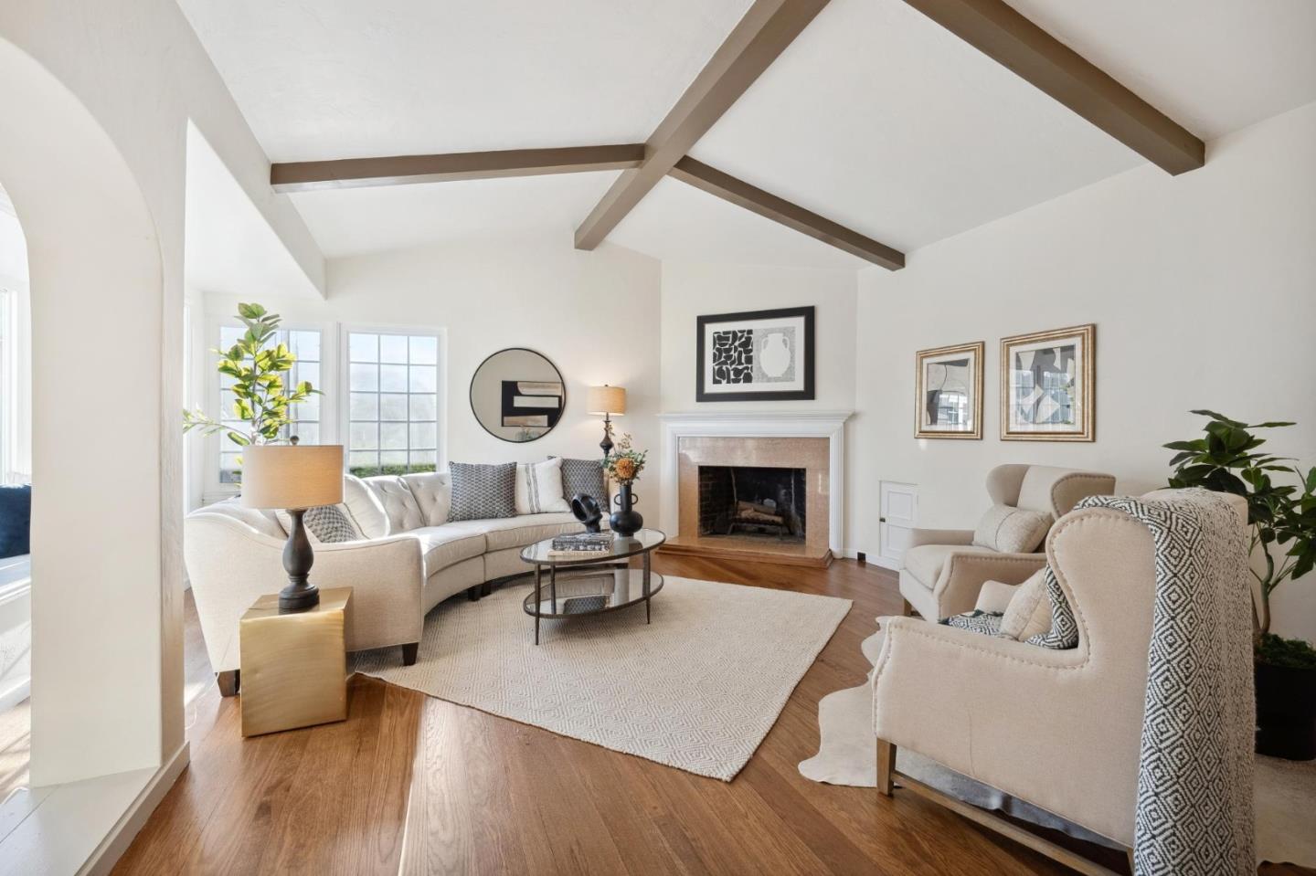1204 Edgehill Drive Burlingame, CA 94010 - Photo 7 of 38 a living room with furniture a fireplace and a large window