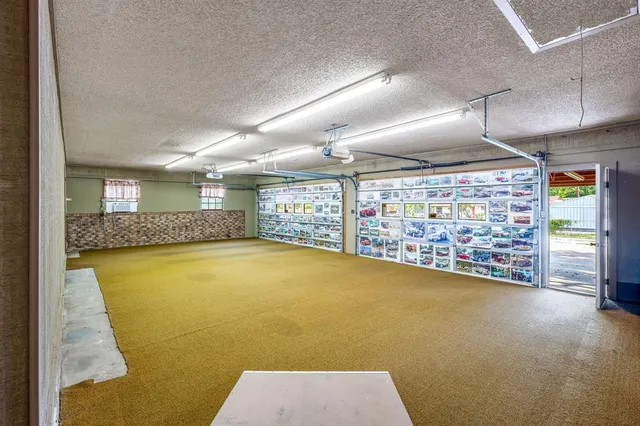 a view of an empty room with windows