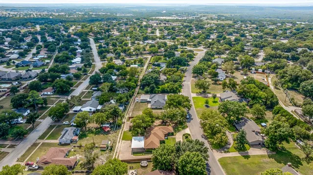 an aerial view of residential house with parking space