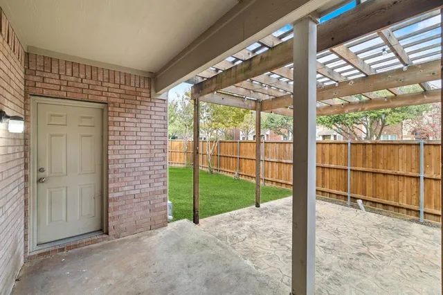 a view of a back yard of the house