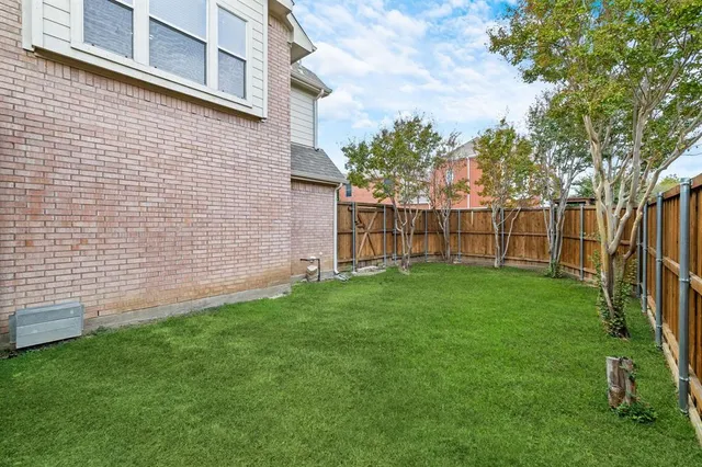 a view of a backyard with a garden