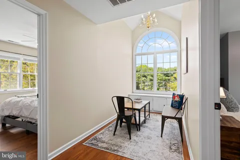 a view of a livingroom with furniture and window