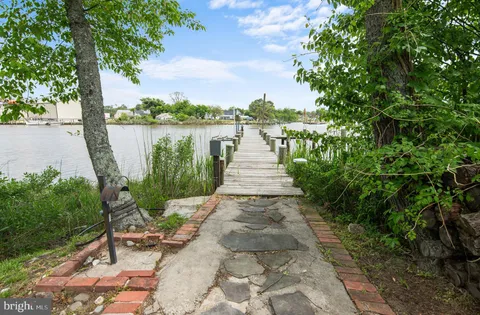 a view of a patio with swimming pool