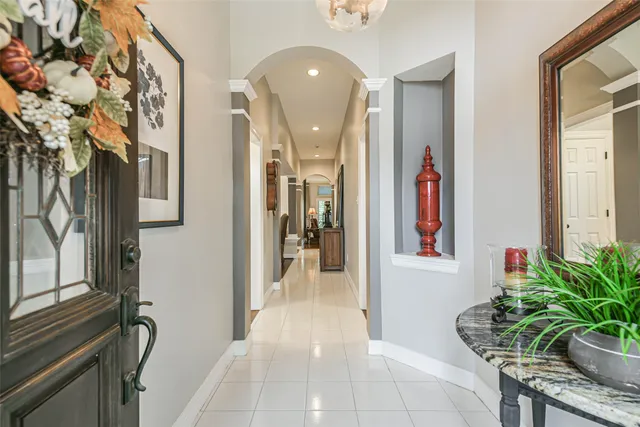 a entryway with furniture and a potted plant