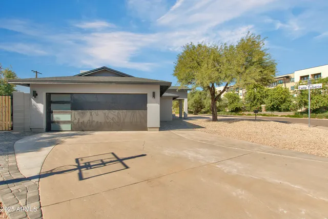 front view of a house with a street