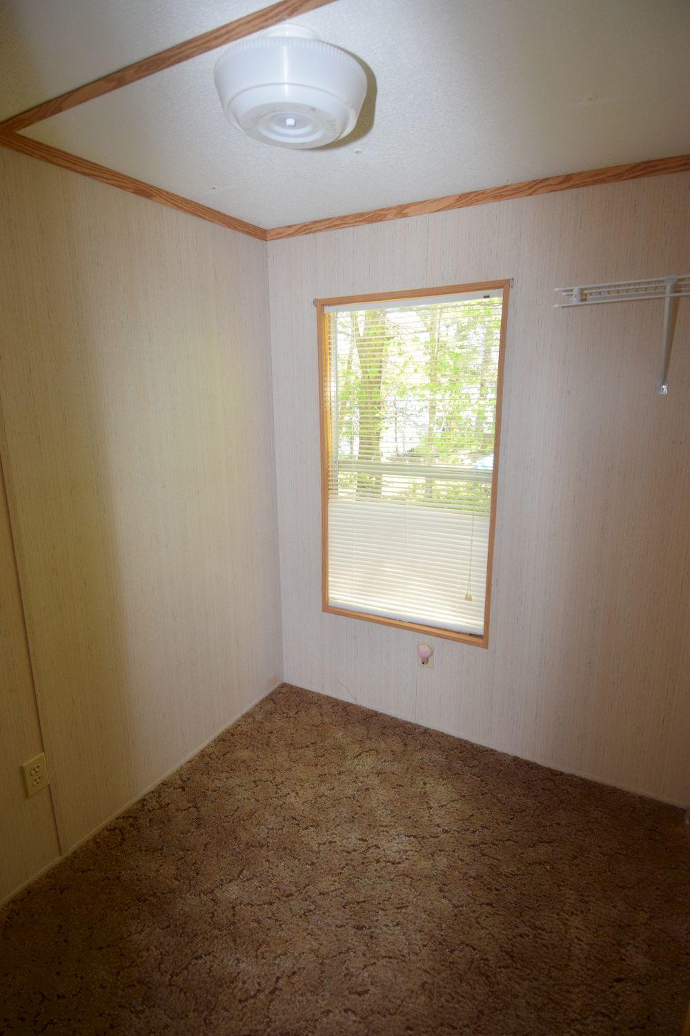 11-12 Rocky Point Road Embden, ME 04958 - Photo 58 of 75 camp 2 - bedroom