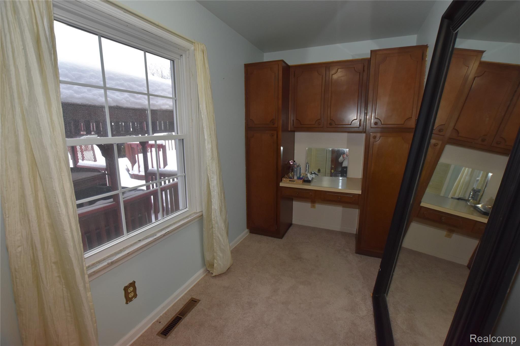 2445 Warner Road Flushing, MI 48433 - Photo 11 of 26 Powder room off master bedroom on main level