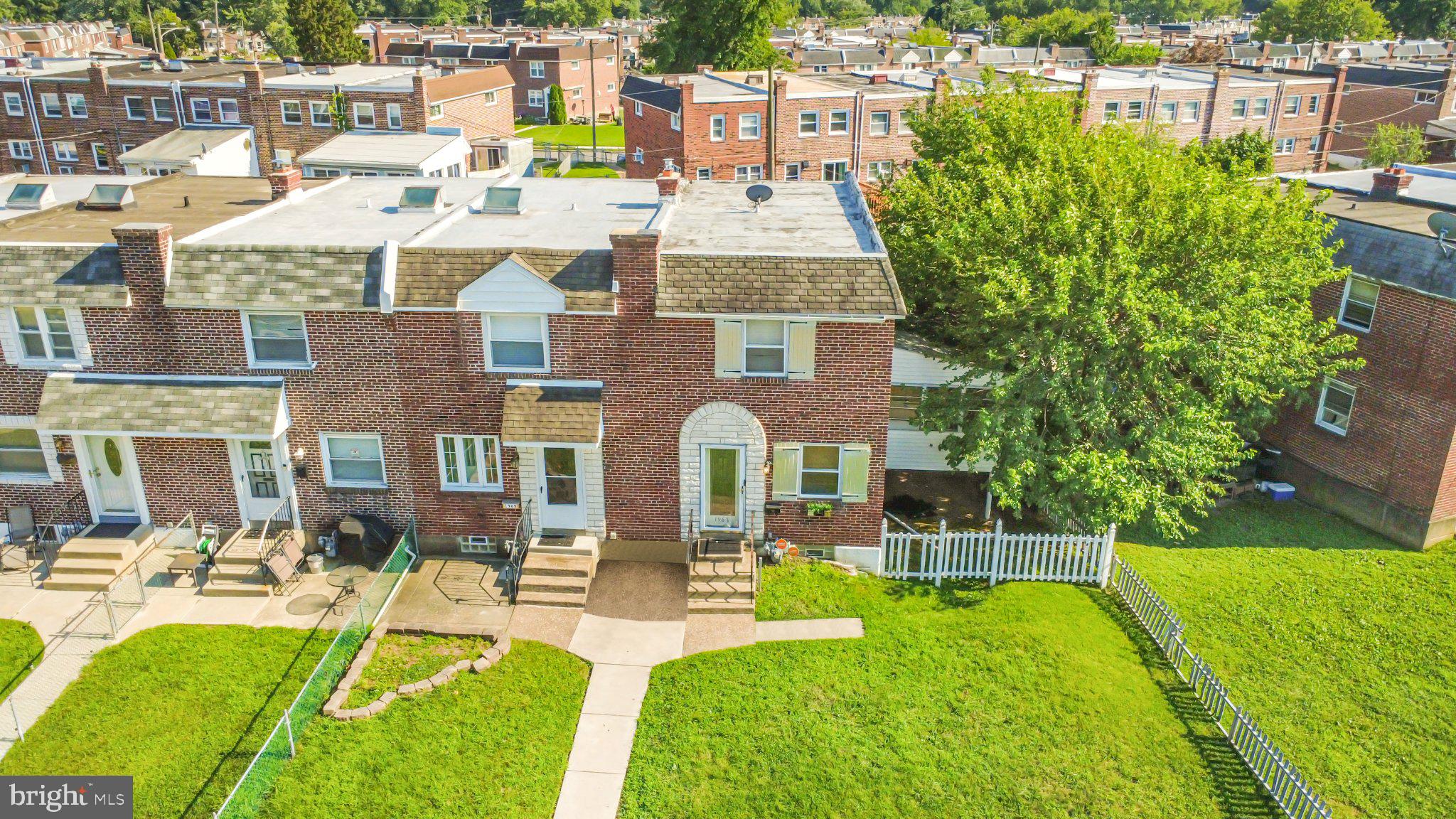 1965 Carter Road Folcroft, PA 19032 - Photo 19 of 20 Charming brick home with lush greenery.