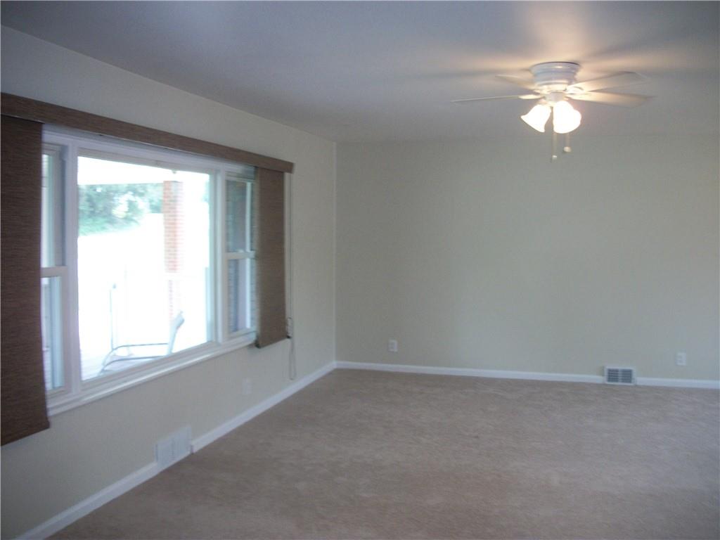 562 Old Waynesburg Road Carmichaels, PA 15320 - Photo 17 of 34 wooden floor in an empty room with a window
