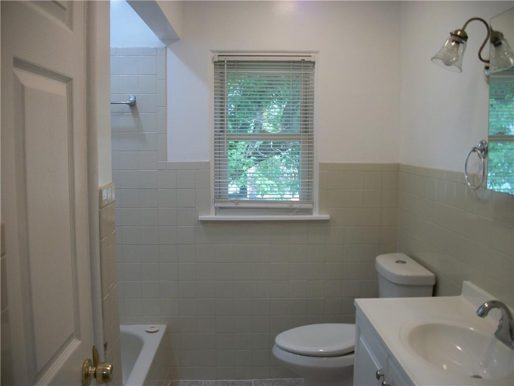 562 Old Waynesburg Road Carmichaels, PA 15320 - Photo 20 of 34 a bathroom with a toilet a sink and a window