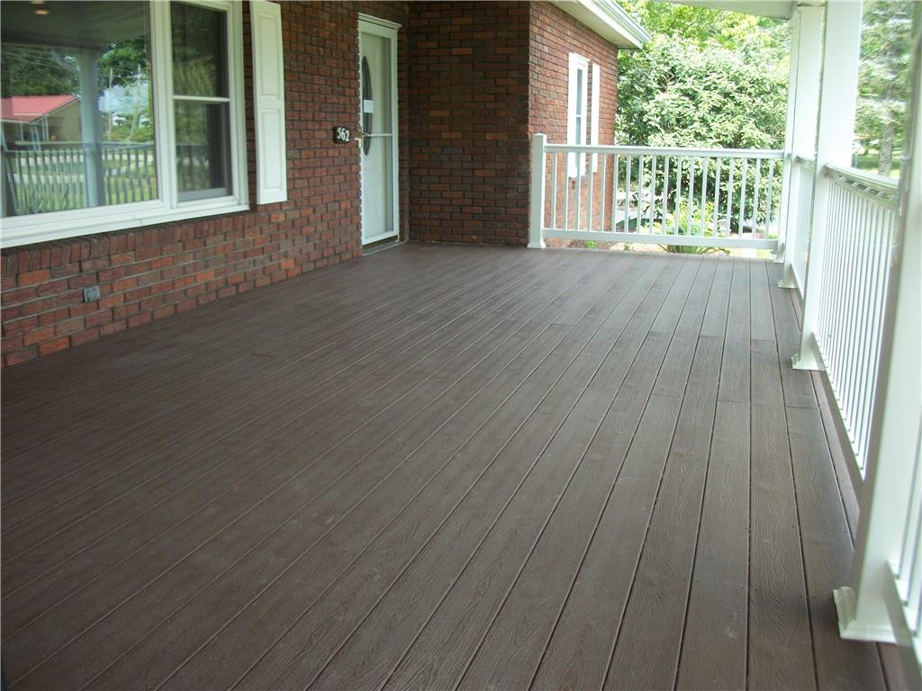 562 Old Waynesburg Road Carmichaels, PA 15320 - Photo 3 of 34 an empty room with wooden floor and windows